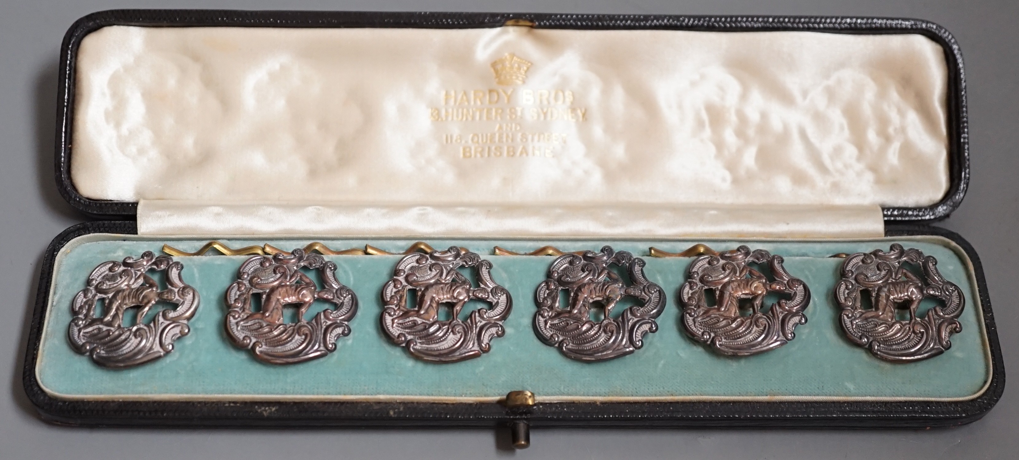 A cased set six late Victorian pierced silver dress buttons, depicting a gentleman wearing a toga, Levi & Salaman, Birmingham, 1899, 25mm.